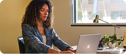 Educator working on laptop